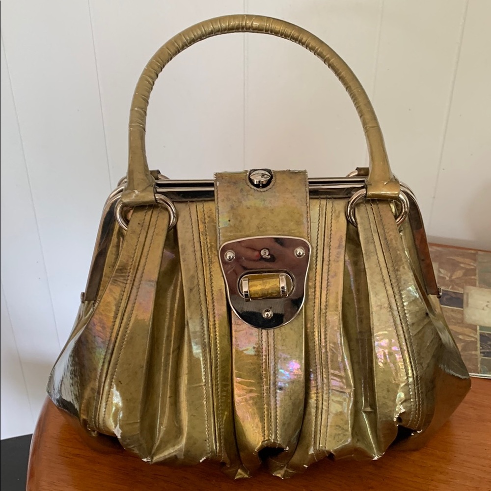 Alexander McQueen gold bag